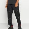 Meilleure affaire 🎁 Jordan ZION WILLIAMSON PANT - Pantalon de survêtement Prix Allégé vêtements basket-ball homme ✔️ -Pas Cher Jordan Magasin 0bc72103529b471291c6649345be054f