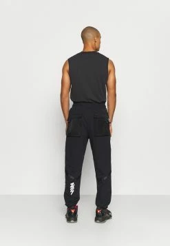Meilleure affaire 🎁 Jordan ZION WILLIAMSON PANT - Pantalon de survêtement Prix Allégé vêtements basket-ball homme ✔️ -Pas Cher Jordan Magasin 56a5aa5c4ae24a0c8c3ff927e2afa159